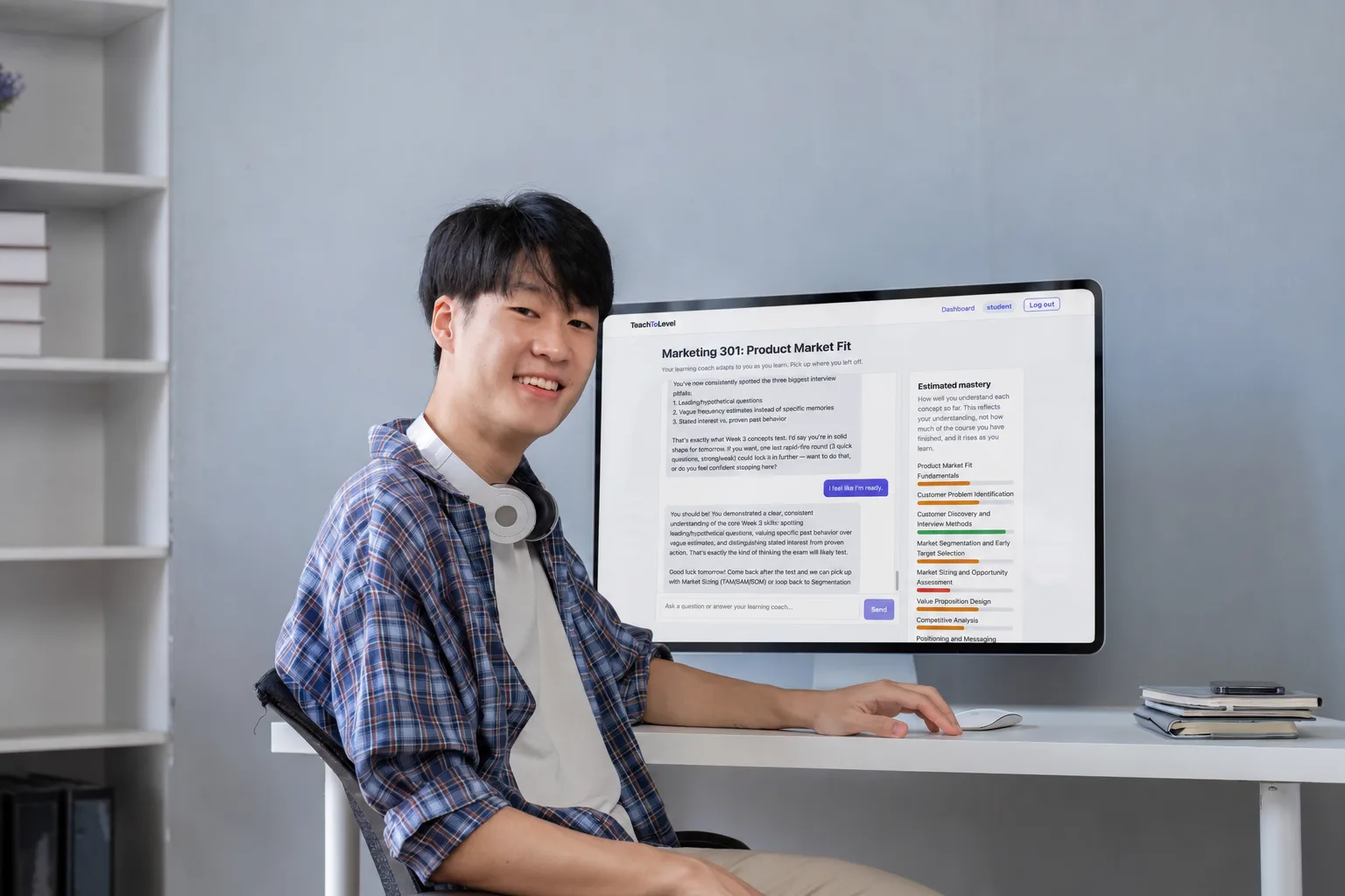 A student working with the TeachToLevel learning coach and mastery chart