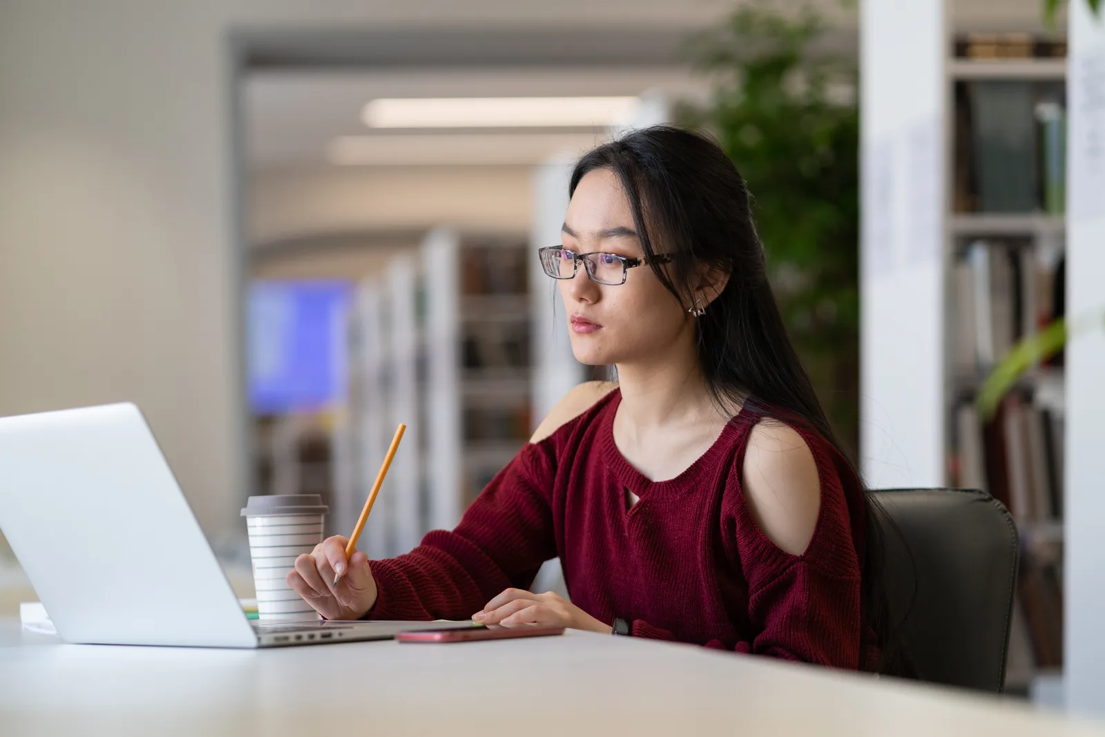 A young student studying at home